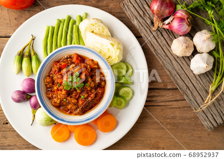 Nam Prik Ong (Northern thai meat and tomato spicy dip Nam Prik Ong (Northern thai meat and tomato spicy dip 68952937