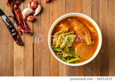 Sour soup with fried fish and mixed Vegetable Sour soup with fried fish and mixed Vegetable 68953035