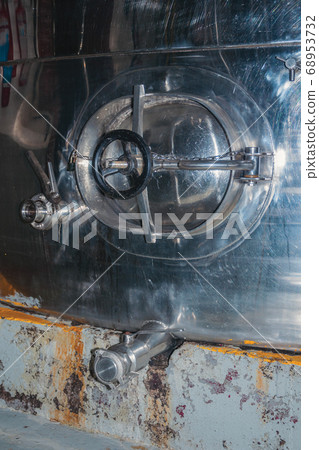 Maintenance hatch in a steel storage tank Maintenance hatch in a steel storage tank 68953732