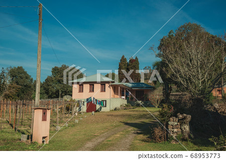 Facade with entrance on old charming cottage 68953773