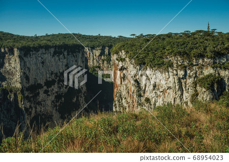 Itaimbezinho Canyon with steep rocky cliffs 68954023