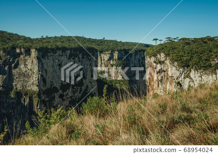 Itaimbezinho Canyon with steep rocky cliffs 68954024