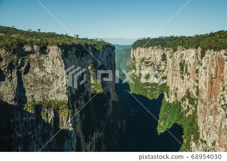 Itaimbezinho Canyon with steep rocky cliffs 68954030