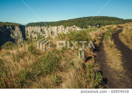 Dirt pathway at the Itaimbezinho Canyon 68954038