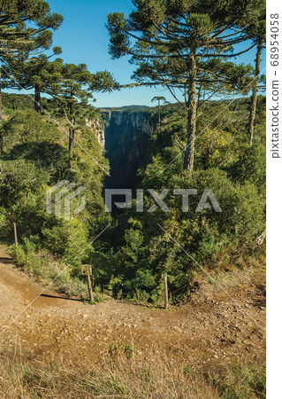 Itaimbezinho Canyon with rocky cliffs and forest Itaimbezinho Canyon with rocky cliffs and forest 68954058