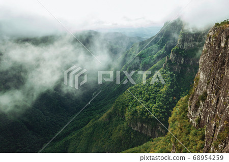Fortaleza Canyon with rocky cliffs in a cloudy day Fortaleza Canyon with rocky cliffs in a cloudy day 68954259