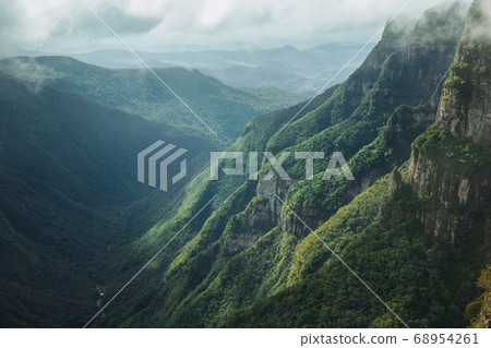 Fortaleza Canyon with rocky cliffs in a cloudy day Fortaleza Canyon with rocky cliffs in a cloudy day 68954261