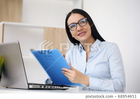 Home office is her place of work 68954651