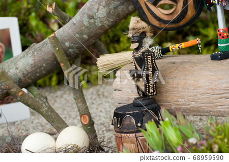 the garden doll at the out door flower bed 68959590