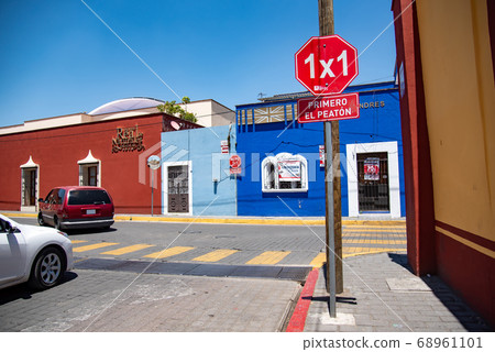 Crossing of colorful buildings in Choluura, Mexico 68961101