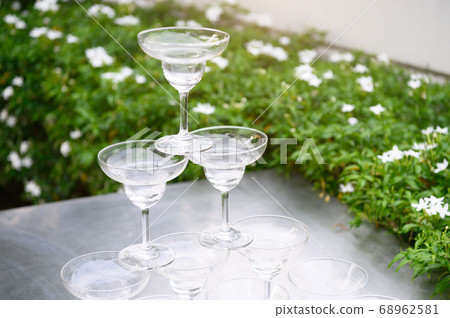 Closeup group of stacking martini wine glasses on Closeup group of stacking martini wine glasses on 68962581