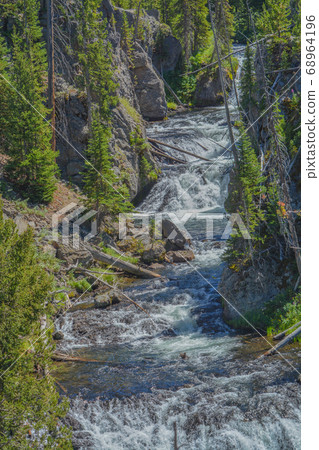 The beautiful Kepler Cascades Waterfall on the Firehole River. Southwestern Yellowstone National Park in the Rocky Mountains, Park County, Wyoming 68964196