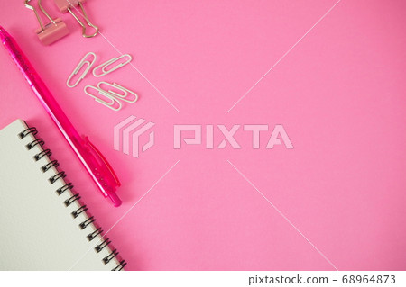 Pen and notebook and stationery arranged on pink background paper (horizontal-right margin) Pen and notebook and stationery arranged on pink background paper (horizontal-right margin) 68964873