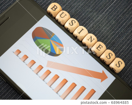 Business characters and graph displayed on smartphone 68964885