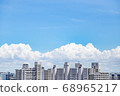 Blue sky, clouds and houses 68965217