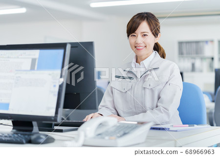 Business woman, young woman, work clothes Business woman, young woman, work clothes 68966963