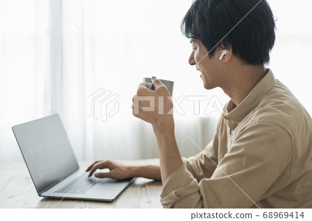 Remote work men and cats Remote work men and cats 68969414