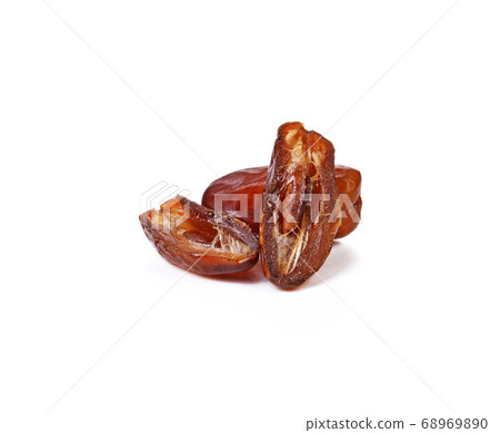 Palm dates on the white background Palm dates on the white background 68969890