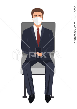 Seating or waiting Businessman with face mask using smart phone app. Train passenger with protective mask texting on mobile phone. Travel safely on public transport 68972549