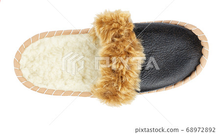 Warm indoor slippers on a white background. Clear Warm indoor slippers on a white background. Clear 68972892