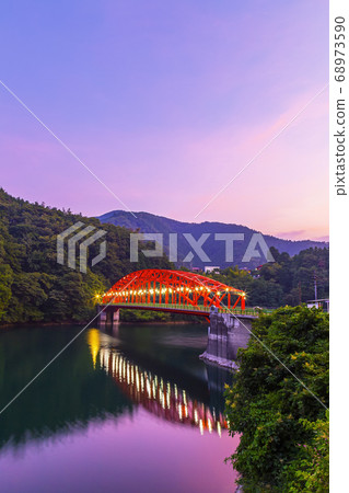 Evening Minedabashi bridge over Lake Okutama in August Evening Minedabashi bridge over Lake Okutama in August 68973590