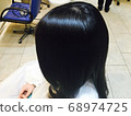 Shiny hair after treatment and color 68974725
