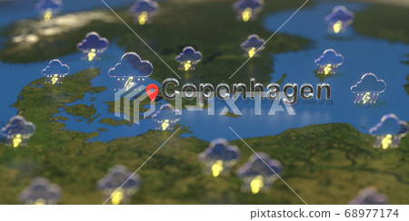 Stormy weather icons near Copenhagen city on the map, weather forecast related 3D rendering Stormy weather icons near Copenhagen city on the map, weather forecast related 3D rendering 68977174