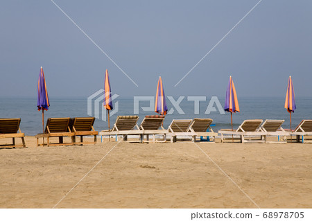 sun loungeres and Umbrellas sun loungeres and Umbrellas 68978705