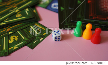 Board game Monopoly with money and plastic chips. No logos or visible brands 68978815