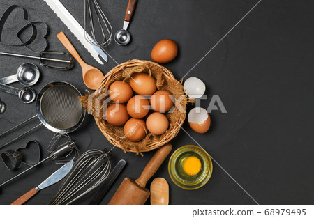Fresh eggs in basket and Kitchen utensils for Fresh eggs in basket and Kitchen utensils for 68979495