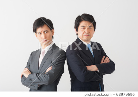 Boss and subordinates staring with scary faces 68979696