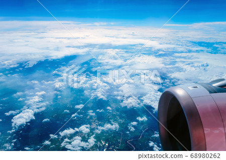 View from an airplane window View from an airplane window 68980262