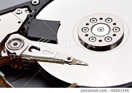 Computer hard disk drive close-up shot. Stacked photo. Computer hard disk drive close-up shot. Stacked photo. 68981348