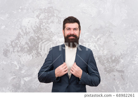Menswear and fashion concept. Man handsome bearded Menswear and fashion concept. Man handsome bearded 68982261