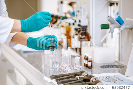 Developing vaccine against coronavirus, covid-2019 in the pharmacy laboratory, chemical develop Developing vaccine against coronavirus, covid-2019 in the pharmacy laboratory, chemical develop 68982477