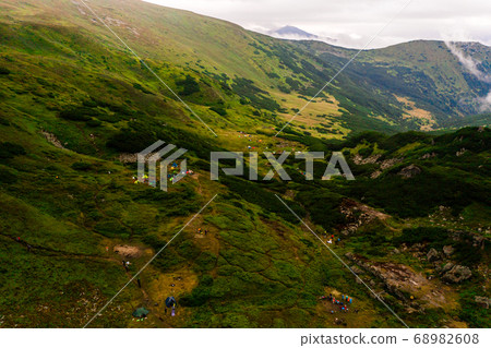 Carpathian lake Brebeneskul and rocky terrain near 68982608