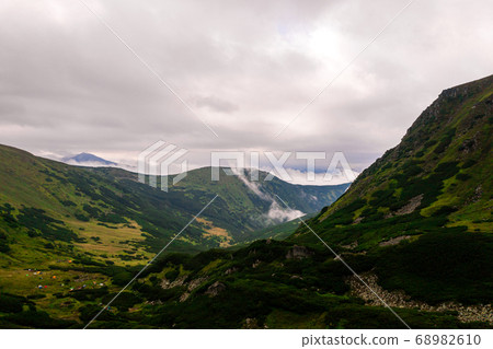 Camping in the mountains, from a height you can 68982610