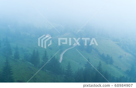 Strong fog in the mountains Strong fog in the mountains 68984907