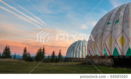 Dramatic sunrise over uniquely designed old radar 68985085