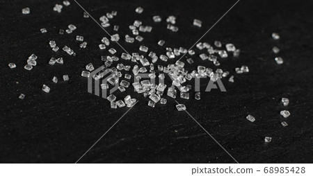 Big Sugar Crystals or Sucrose Crystals on Black 68985428