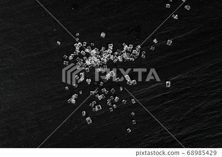 Big Sugar Crystals or Sucrose Crystals on Black 68985429
