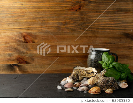 Fresh Oysters, Molluscs and Mussels in Seafood Fresh Oysters, Molluscs and Mussels in Seafood 68985580