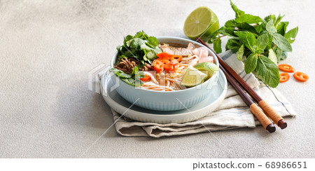 Bun Bo Hue, Bun Bo, Vietnamese beef noodle soup spicy. bowl of beef and rice vermicelli soup, vietnamese noodle cuisine in Hue 68986651