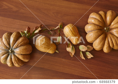 Autumn background with pumpkins 68988379