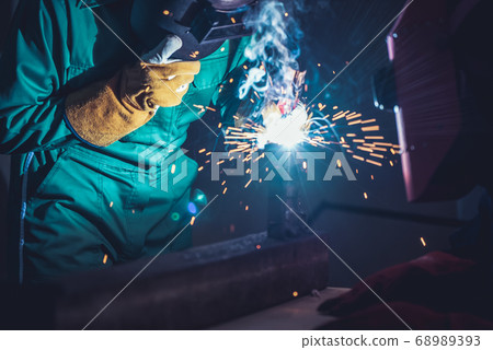 Metal welding steel works using electric arc welding machine Metal welding steel works using electric arc welding machine 68989393