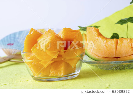 Yubari's sweet red meat melon, studio shot Yubari's sweet red meat melon, studio shot 68989852