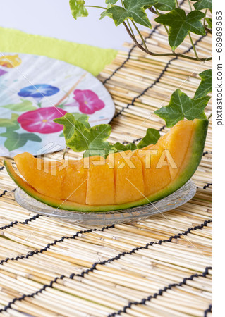 Yubari's sweet red meat melon, studio shot Yubari's sweet red meat melon, studio shot 68989863