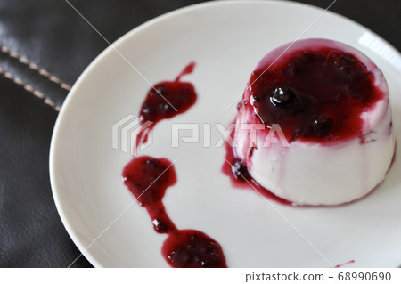 Homemade yogurt jelly with mixed berry sauce Homemade yogurt jelly with mixed berry sauce 68990690