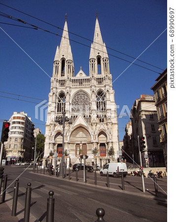Beautiful large church on the street corner Beautiful large church on the street corner 68990697