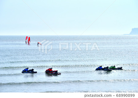 Water bikes and windsurfers moored at the Zaimokuza coast Water bikes and windsurfers moored at the Zaimokuza coast 68990899